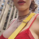 Bella Thorne red pokies